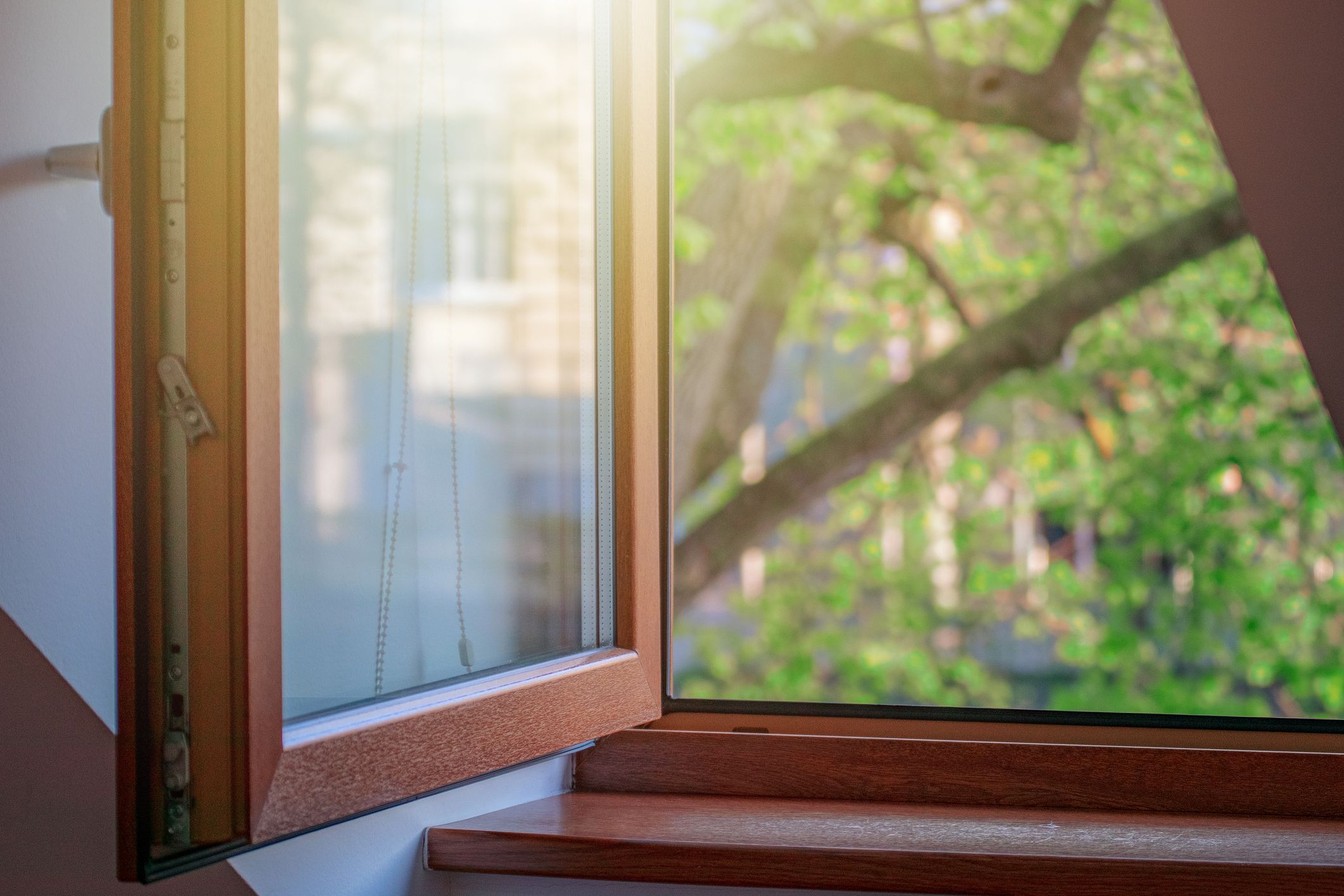 House window open, letting in fresh air.